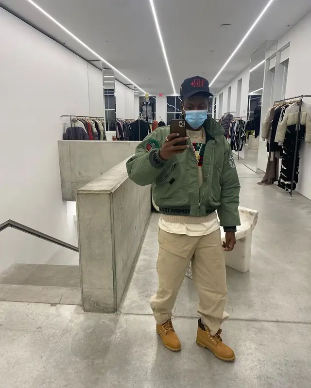 Joey Badass outfit in Denim Tears, JW Anderson, and Timberland, 2021