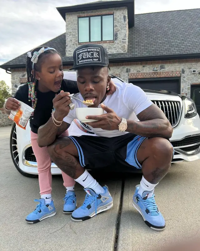 DaBaby outfit in Mitchell & Ness, Chrome Hearts, and Nike, 2021
