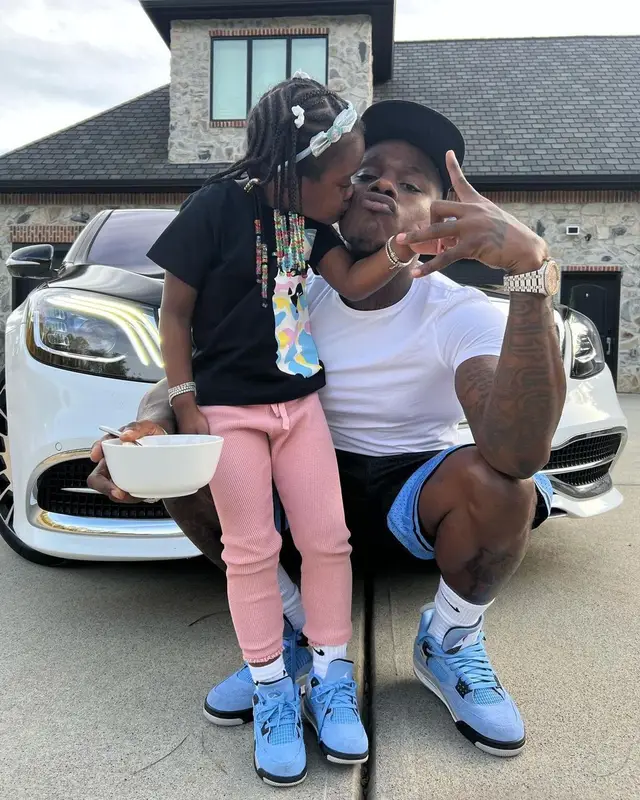 DaBaby outfit in Mitchell & Ness, Chrome Hearts, and Nike, 2021