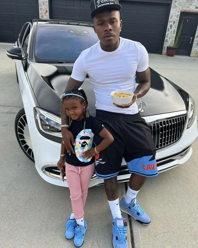 DaBaby outfit in Mitchell & Ness, Chrome Hearts, and Nike, 2021