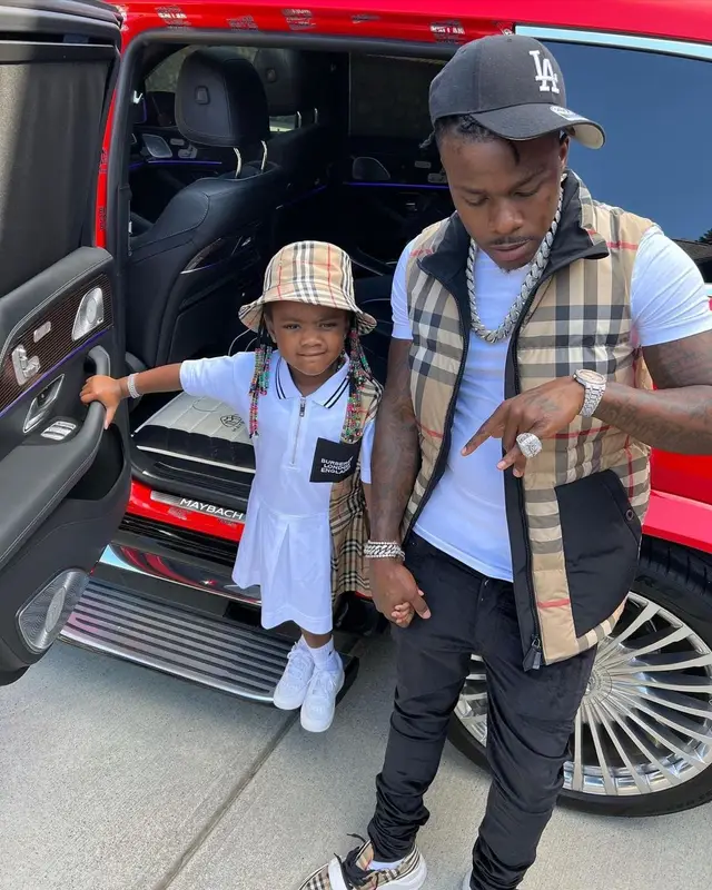 DaBaby outfit in Burberry, Hanes, and New Era, 2021