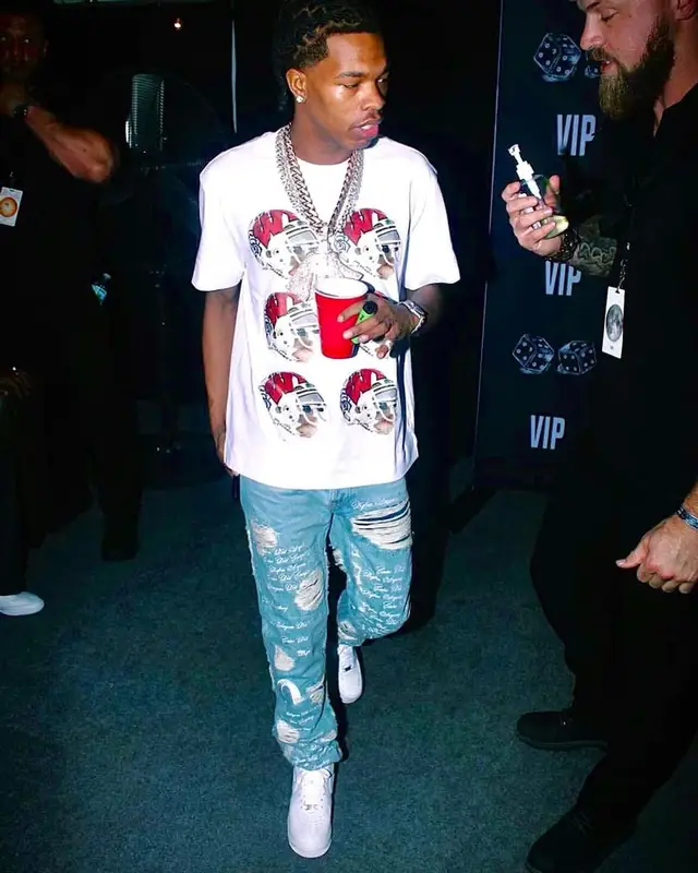 Lil Baby outfit in Aris Tatalovich, Evisu, and Who Decides War, 2021
