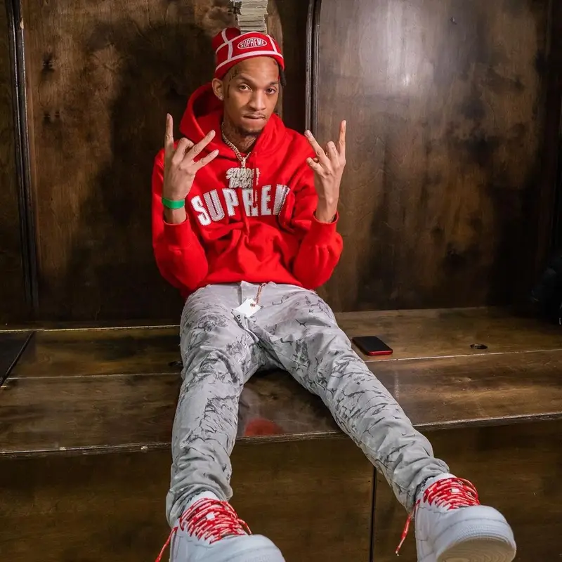 Stunna 4 Vegas outfit in Purple Brand, Nike, and Supreme, 2021