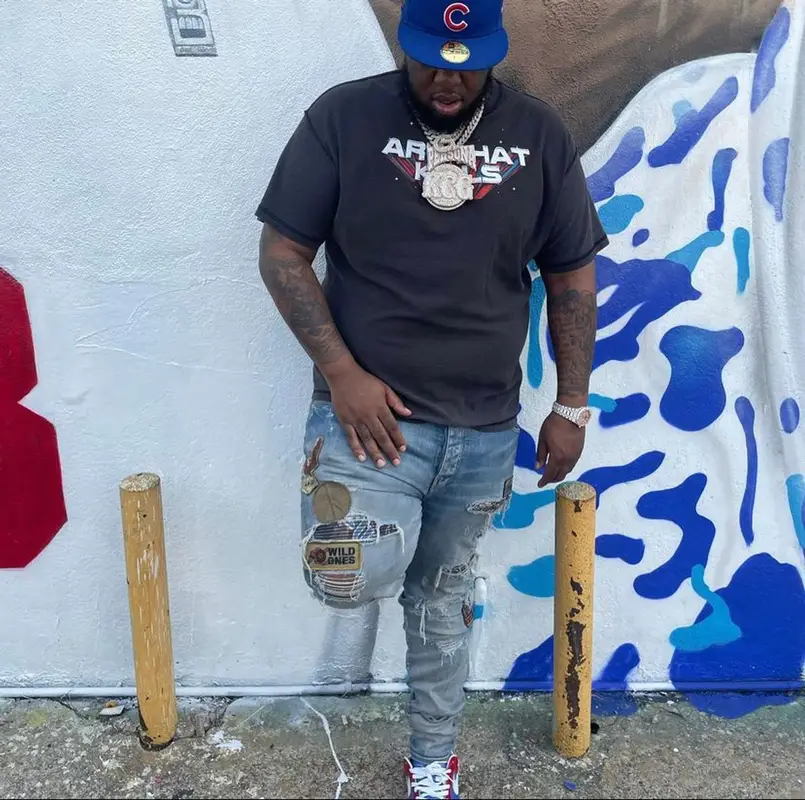 Maxo Kream outfit in Gallery Dept., Louis Vuitton, and New Era, 2021
