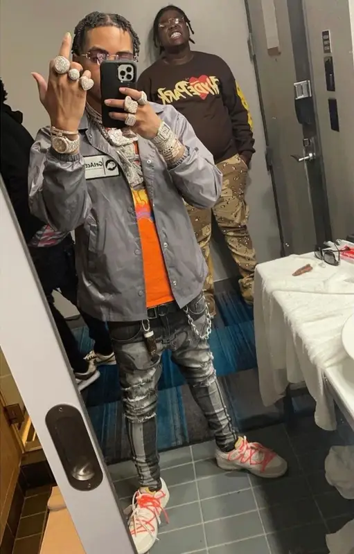 Lil Migo outfit in Nike, Dior, and Cartier, 2021