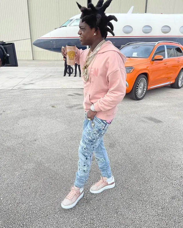 Kodak Black outfit in Alexander McQueen, Amiri, and Versace, 2021