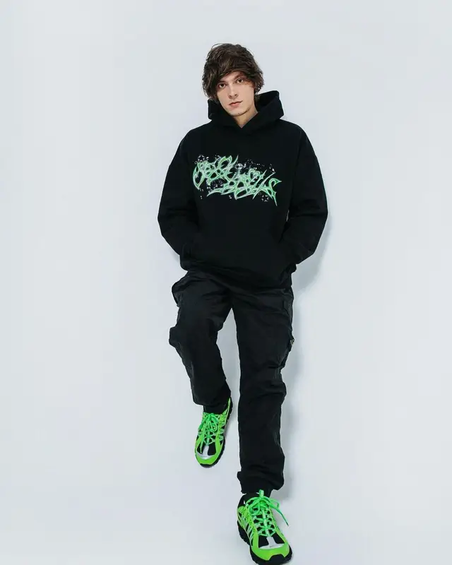 OG Buda outfit in Stone Island, Supreme, and Versace, 2021