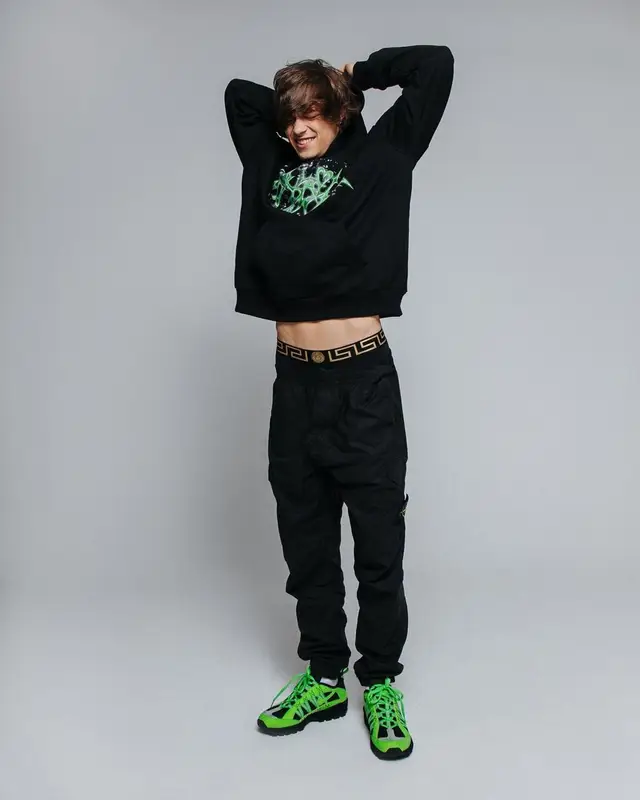 OG Buda outfit in Stone Island, Supreme, and Versace, 2021