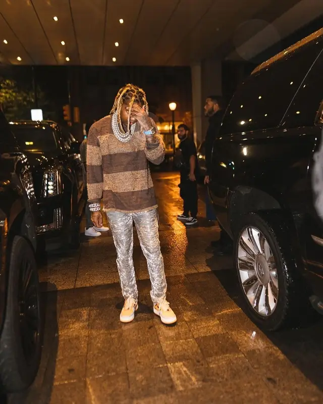 Lil Durk outfit in Mastermind, Amiri, and Bape, 2021