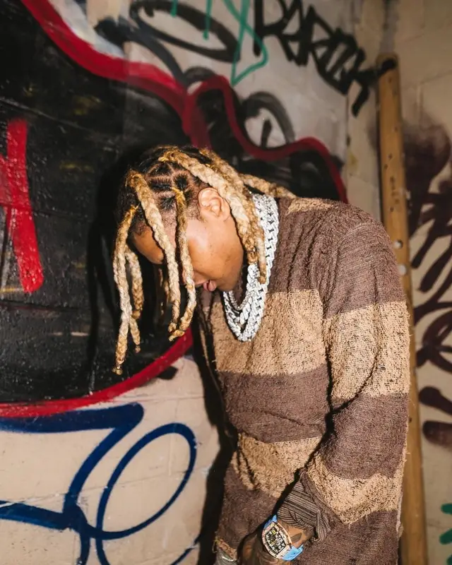 Lil Durk outfit in Mastermind, Amiri, and Bape, 2021