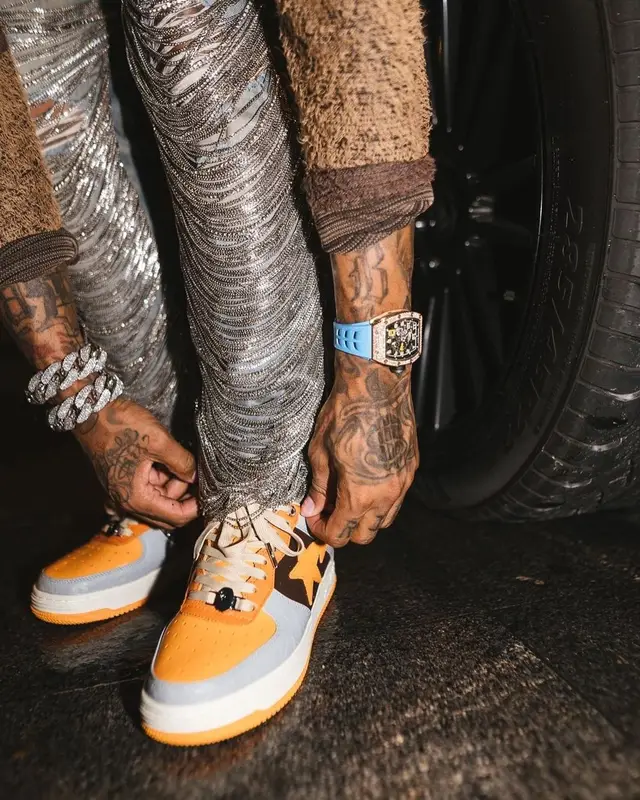 Lil Durk outfit in Mastermind, Amiri, and Bape, 2021