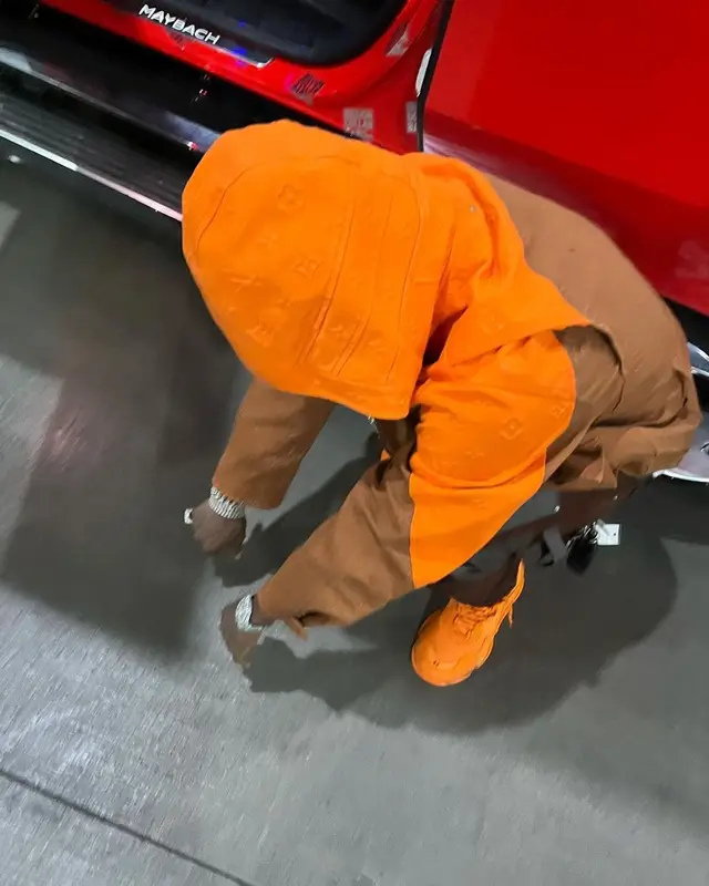 DaBaby outfit in Louis Vuitton, Amiri, and Balenciaga, 2021