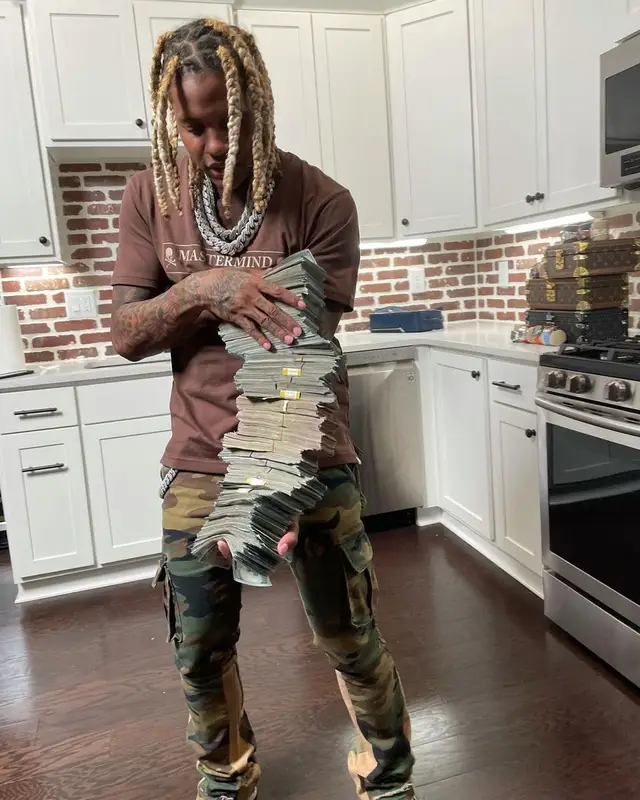 Lil Durk outfit in Burberry, Mastermind, and Valabasas, 2021