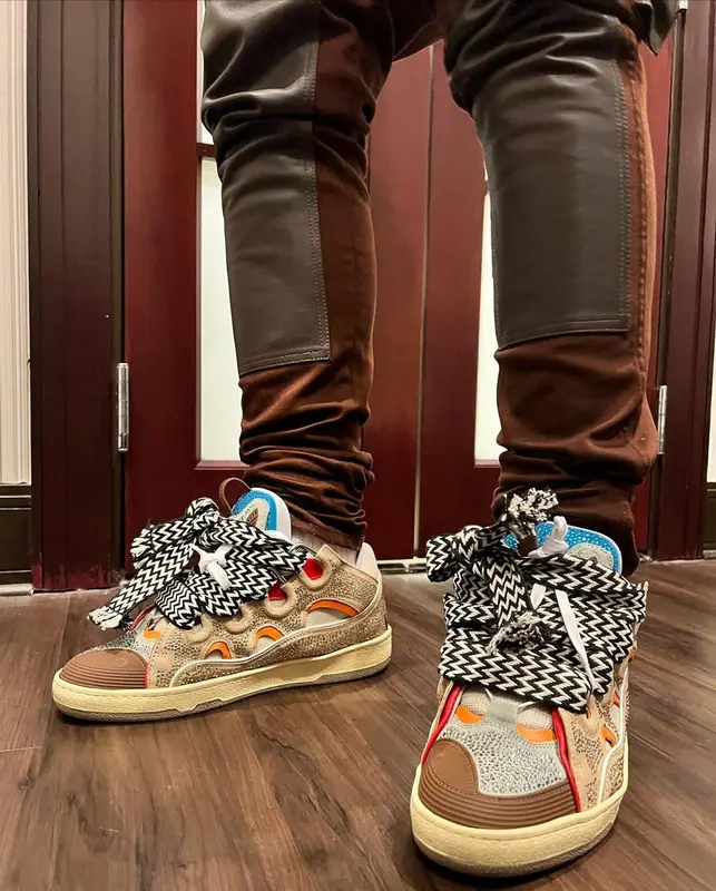 Moneybagg Yo outfit in Amiri, Lanvin, and Louis Vuitton, 2021