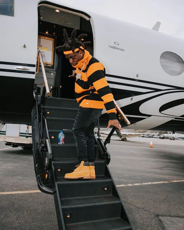 Kodak Black outfit in Burberry, Amiri, and Timberland, 2021