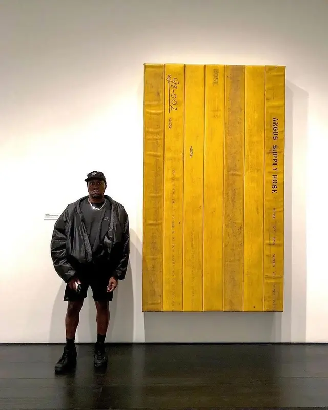 Kanye West outfit in Yeezy, Balenciaga, and GAP, 2021