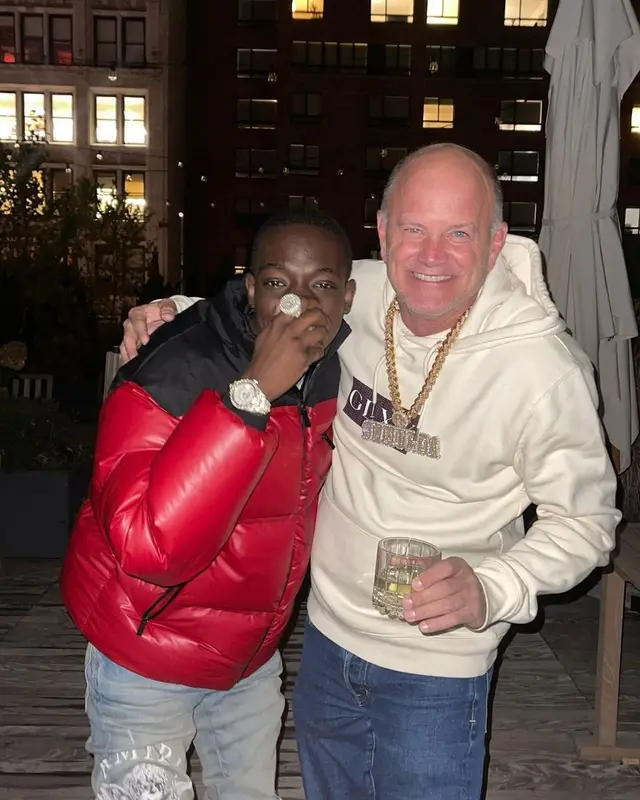 Bobby Shmurda outfit in Prada, Amiri, and Louis Vuitton, 2021