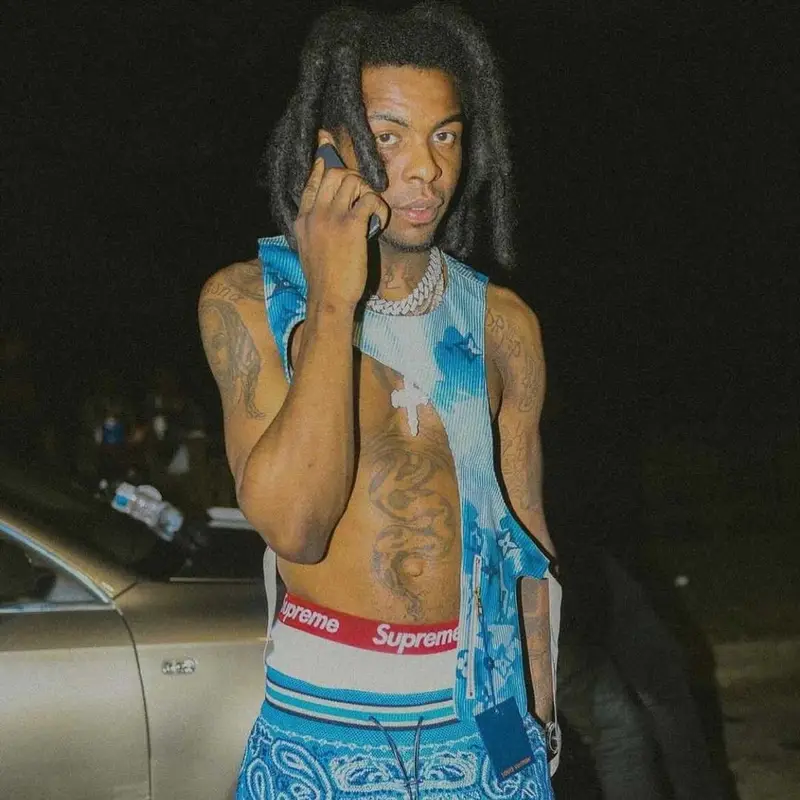 Yak Gotti outfit in Louis Vuitton, Supreme, and Amiri, 2021