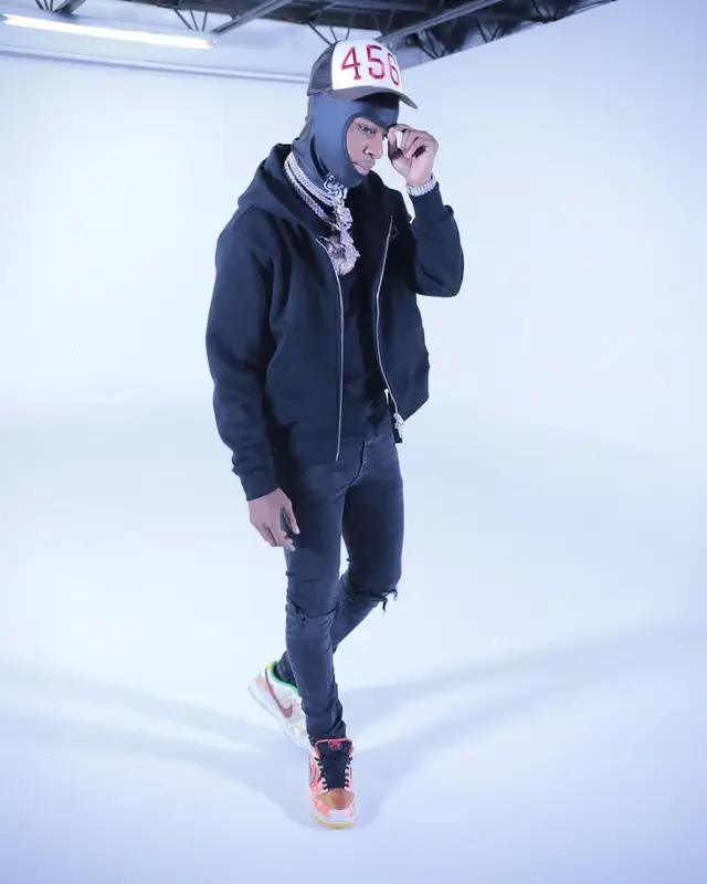 Toosii outfit in Amiri, Purple Brand, and Nike, 2021