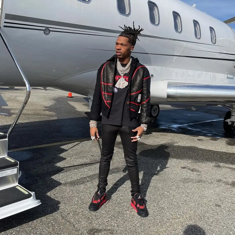 Lil Baby outfit in Louis Vuitton, Amiri, and NBA, 2021