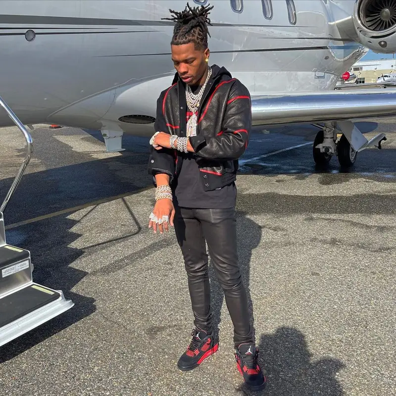 Lil Baby outfit in Louis Vuitton, Amiri, and NBA, 2021