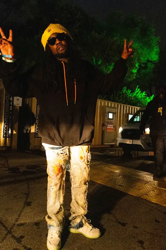 Wale outfit in Who Decides War, Louis Vuitton, and Moncler, 2021
