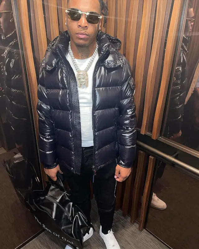 Lil Keed outfit in Moncler, Amiri, and Supreme, 2021