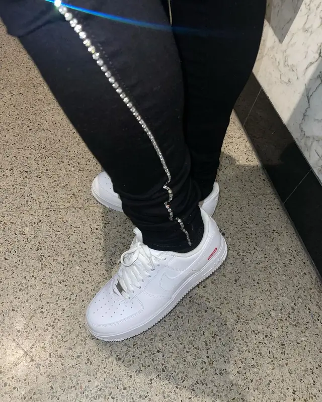 Lil Keed outfit in Moncler, Amiri, and Supreme, 2021