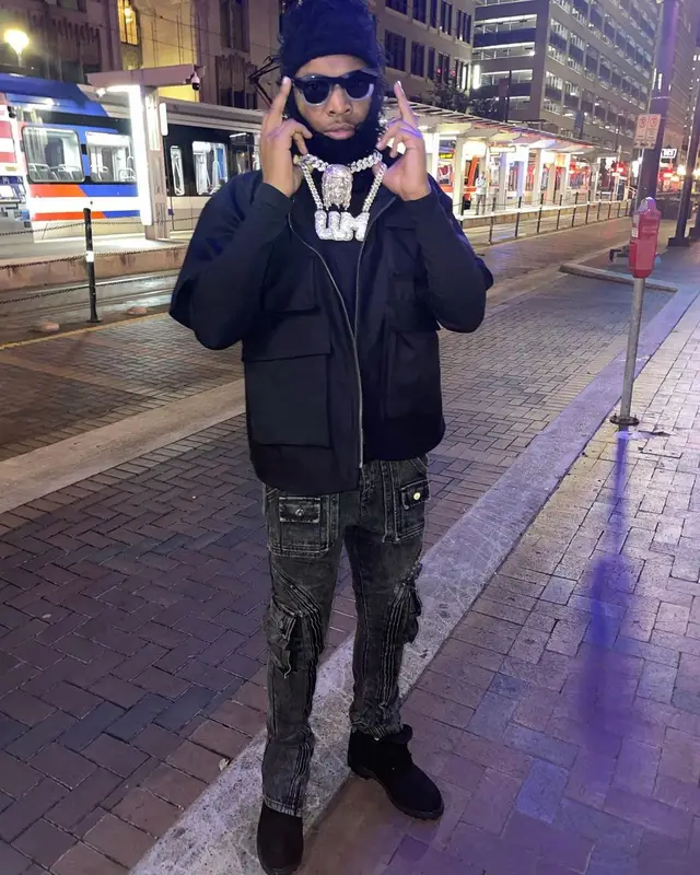 Lil Keed outfit in Ryan Knew, Timberland, and Greedy Unit, 2021