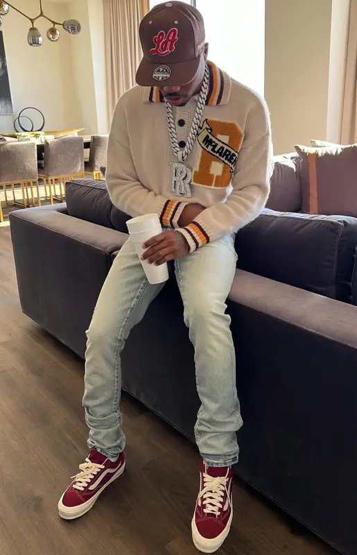 Roddy Ricch outfit in Rhude, Amiri, and Mitchell & Ness, 2021