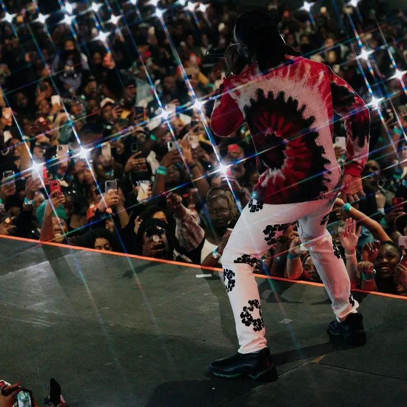 Burna Boy outfit in Emotionally Unavailable, Denim Tears, and Bottega Veneta, 2021