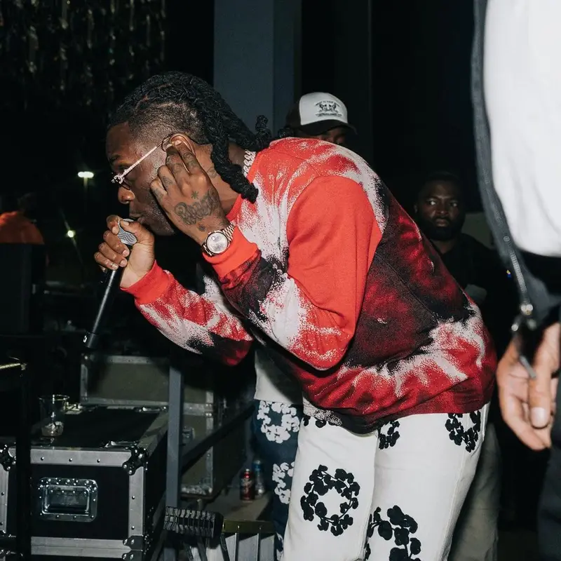Burna Boy outfit in Emotionally Unavailable, Denim Tears, and Bottega Veneta, 2021