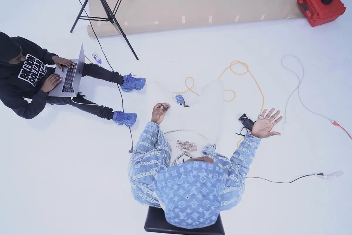 DaBaby outfit in Supreme and Louis Vuitton, 2021