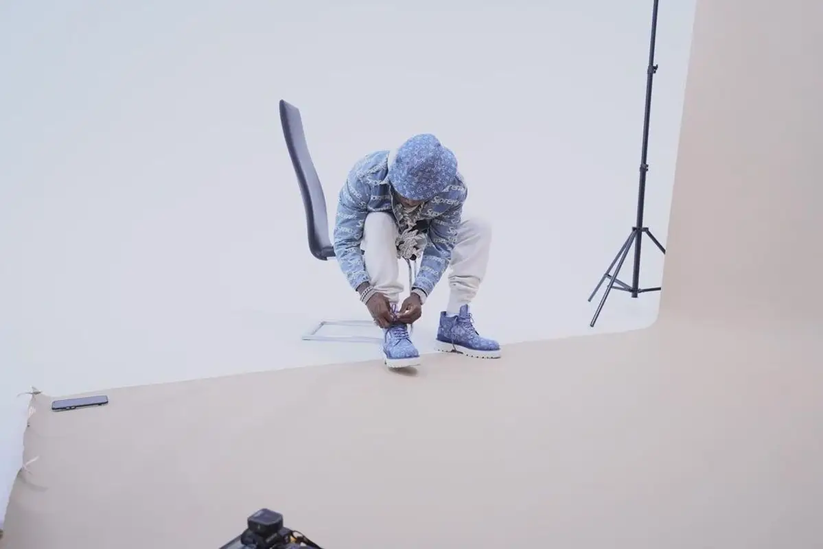 DaBaby outfit in Supreme and Louis Vuitton, 2021