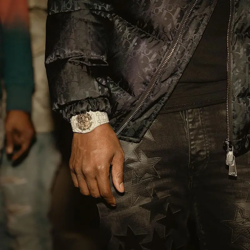 Yo Gotti outfit in Dior, Chemist, and Amiri, 2021