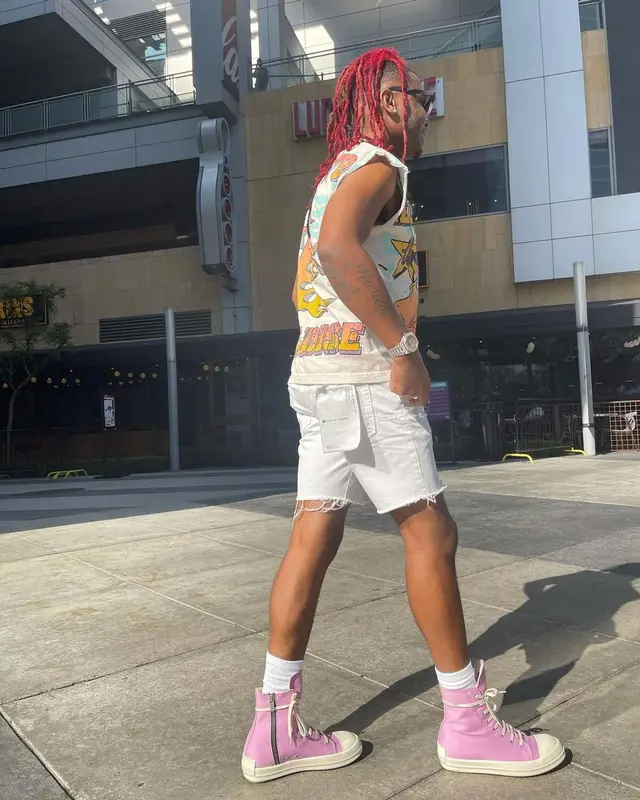 Lil Keed outfit in Purple Brand, Rick Owens, and Thierry Lasry, 2021