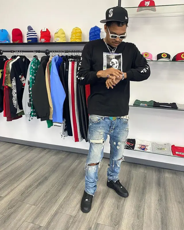 Lil Raven outfit in Nike, B.B. Simon, and New Era, 2021