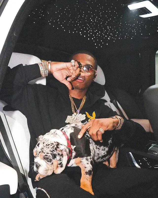 TJ Porter outfit in Amiri, Cartier, and Playboy, 2021
