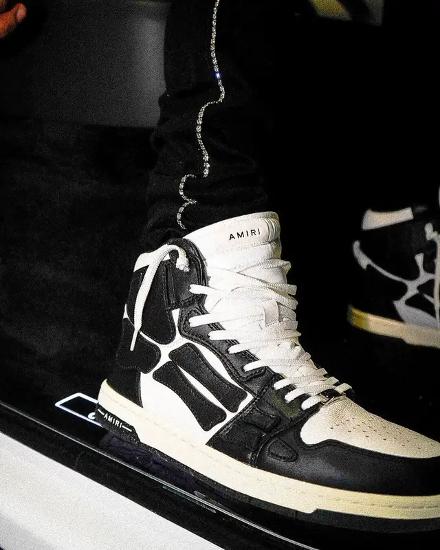 TJ Porter outfit in Amiri, Cartier, and Playboy, 2021