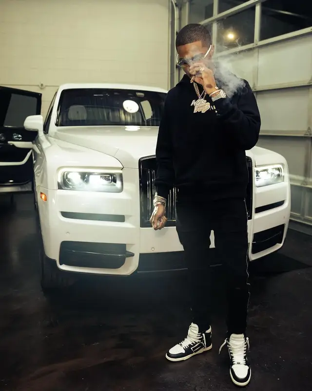 TJ Porter outfit in Amiri, Cartier, and Playboy, 2021