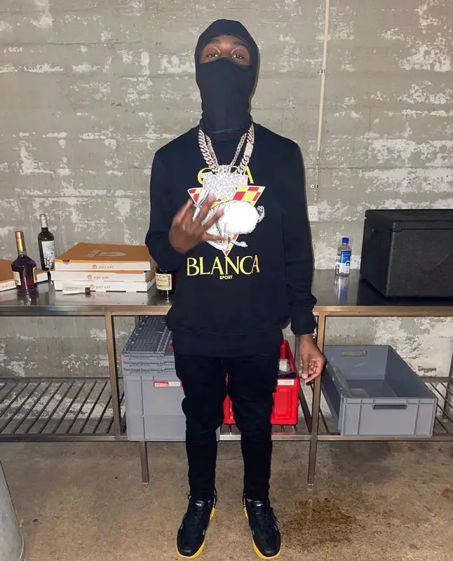 Lil Tjay outfit in Casablanca, Amiri, and No Name, 2021