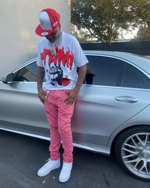 Lil Keed outfit in Itami, Purple Brand, and Nike, 2021