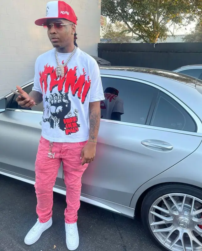 Lil Keed outfit in Itami, Purple Brand, and Nike, 2021