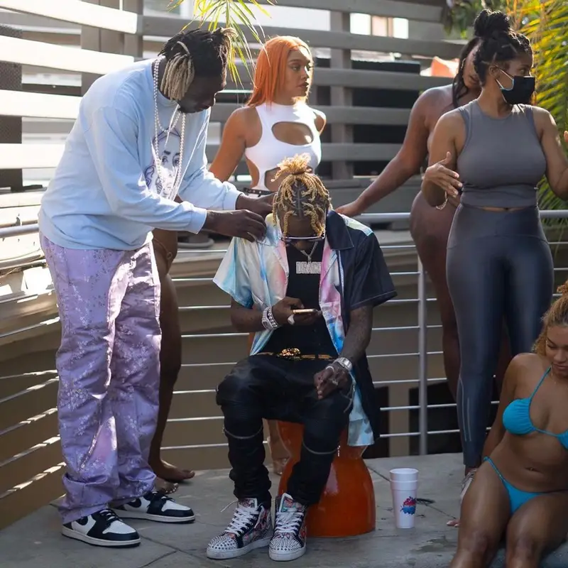 Soulja Boy outfit in Represent, Versace, and Dita, 2021