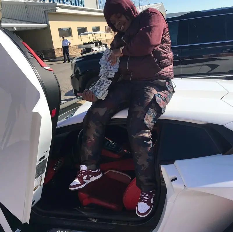 42 Dugg outfit in Dior, Peter Doig, and Nike, 2021