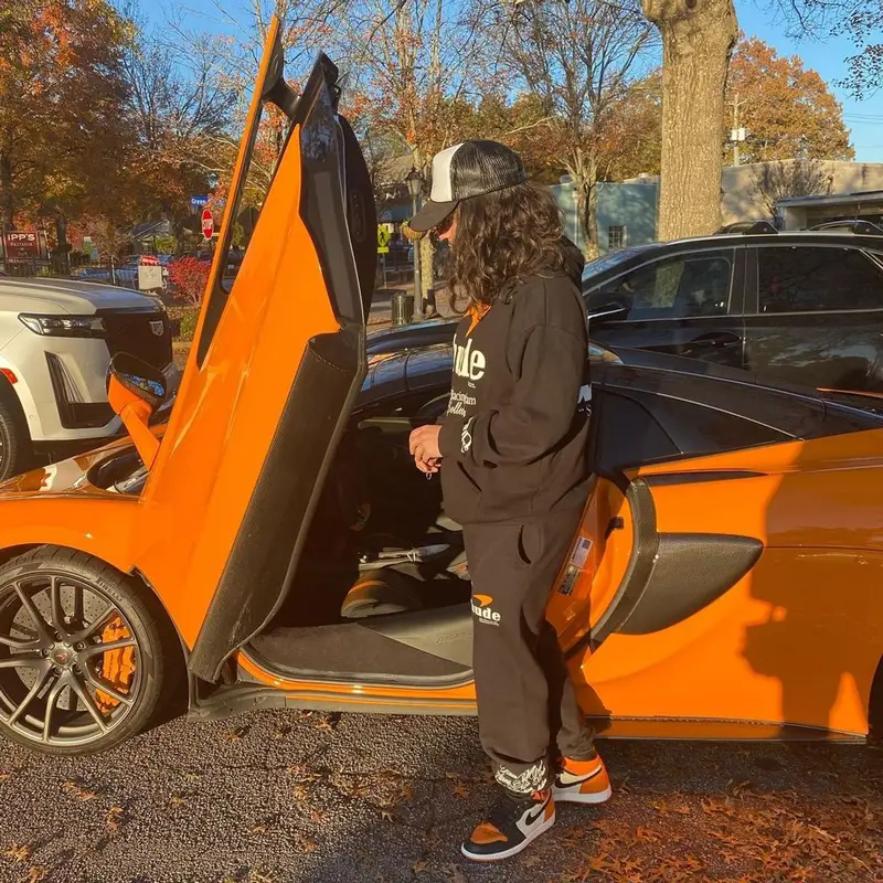 Russ outfit in Rhude, Nike, and Daniel Ricciardo Merch, 2021