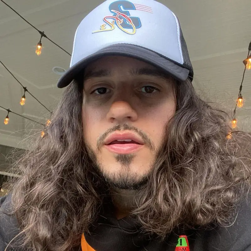Russ outfit in Rhude, Nike, and Daniel Ricciardo Merch, 2021