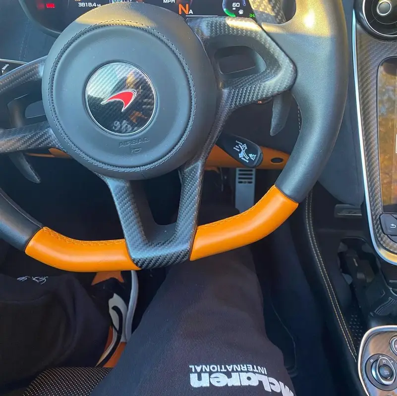 Russ outfit in Rhude, Nike, and Daniel Ricciardo Merch, 2021