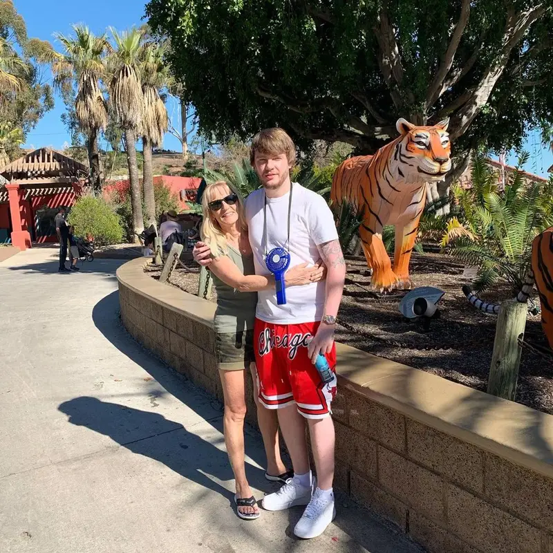 Murda Beatz outfit in Polo Ralph Lauren, Just Don, and Mitchell & Ness, 2021