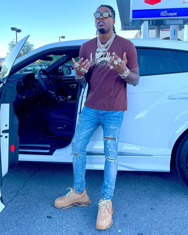 CJ So Cool outfit in Amiri, Balenciaga, and Louis Vuitton, 2021